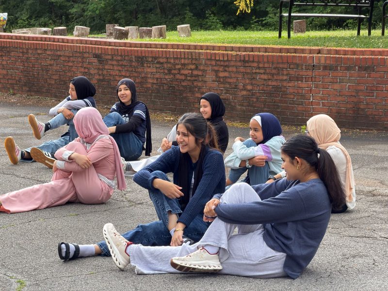 Ibn Abbas Youth Program: Friends Sitting Outdoors