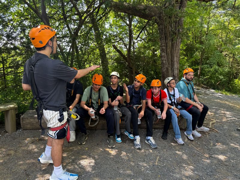 Ibn Abbas Youth Program: Zipline Friends Waiting Outdoors