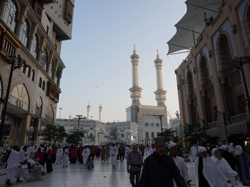 Street view toward the mosque and its minarets