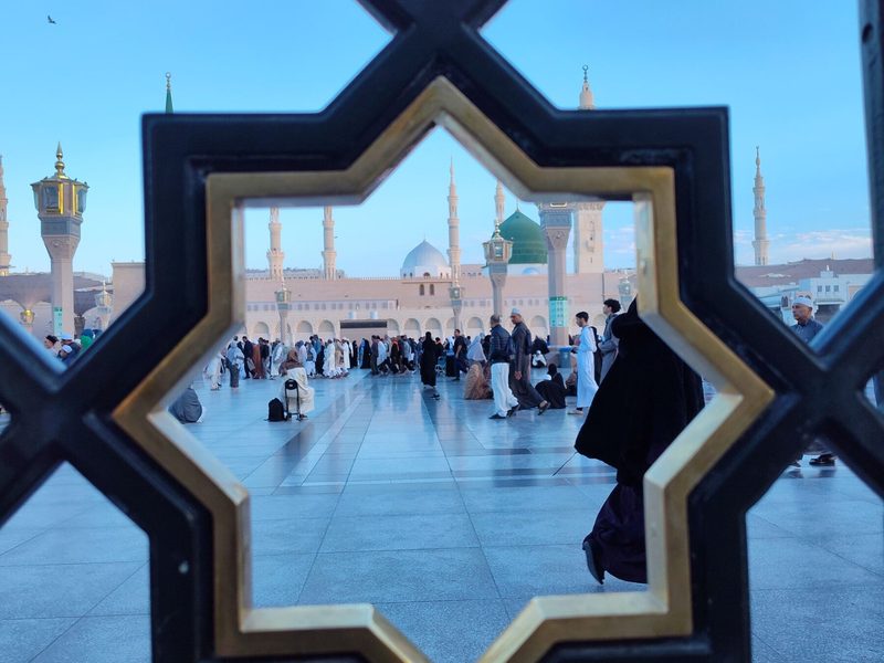 The mosque framed by a star-shaped window