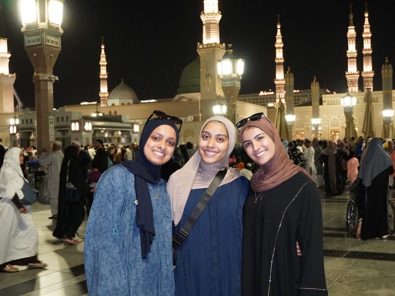 Tayseer Umrah travelers at the mosque at night