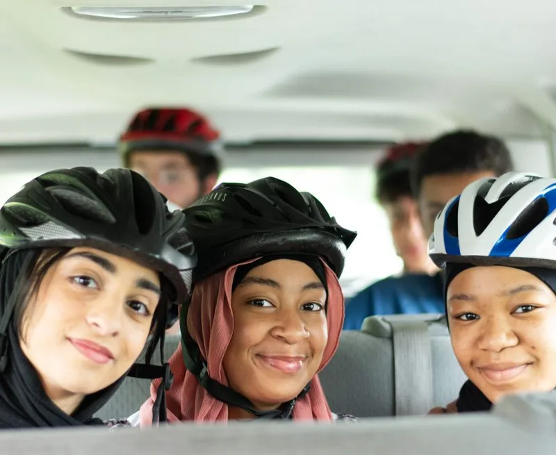 Ibn Abbas Youth Program: Bus Ride Friends Smiling